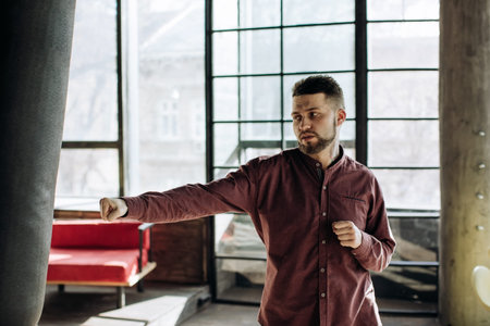 Man relaxes in office during work day