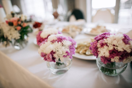 Beautiful wedding decor with fresh flowers and candles. Wedding ideas