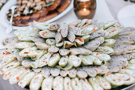 Assorted snacks catering table on wedding ceremonyの写真素材