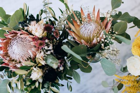 Beautiful wedding bouquet of exotic flowers of different colorsの写真素材