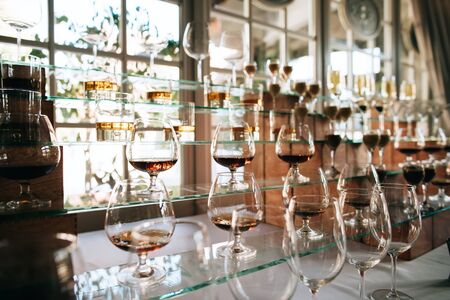 Catering service. waiter pouring champagne. Wedding drink bar.	の写真素材