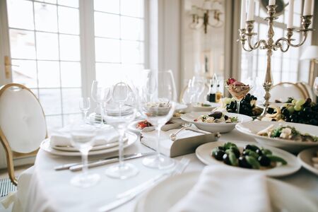 catering service. table with food and drink at restaurant before wedding partyの写真素材