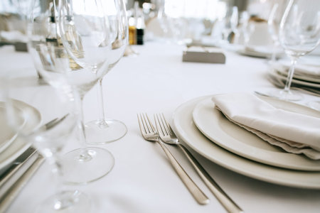 Served table in restaurant with dishes and glasses