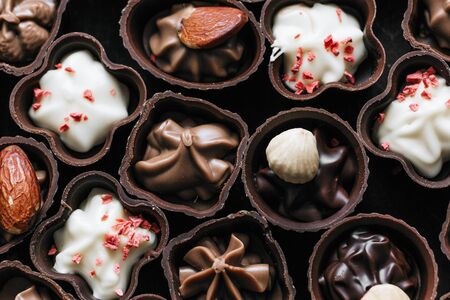 Delicious chocolates with almonds and cinnamon. Sweetsの写真素材