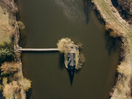 Aerial top view with drone Old house on a forest lakeの写真素材