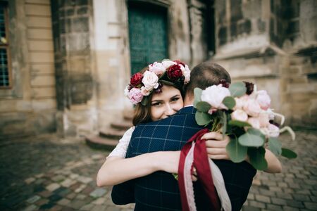 Sensual portrait of a young couple. Wedding day in cityの写真素材
