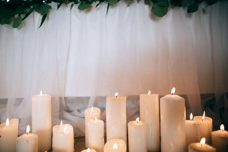 Bridal wedding table decor in a restaurant. Candlesの写真素材