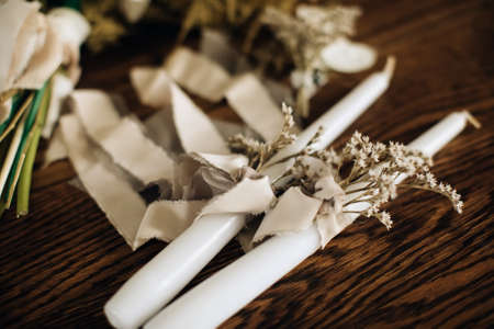 Candles with flowers for the wedding ceremony in the churchの写真素材