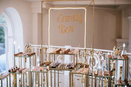 Dessert table with various sweets at a holiday party. candy barの写真素材