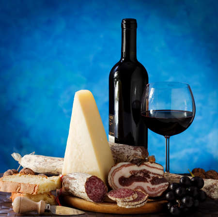 Wine and cheese and salamiの写真素材