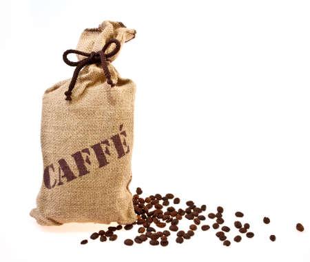 Jute sack with coffee beans isolated on a white background の写真素材