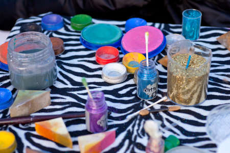 Glitter and colors for carnival make upの写真素材