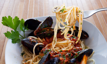 Italian pasta with mussels and other seafoodの写真素材