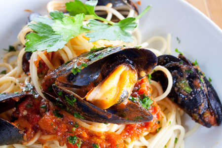 Italian pasta with mussels and other seafoodの写真素材