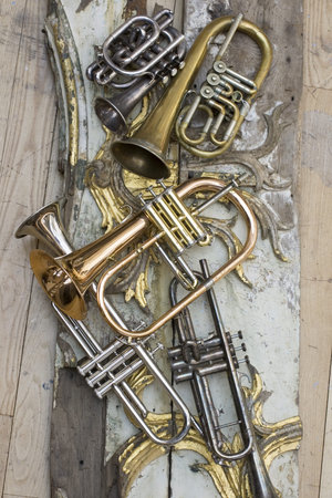 Trumpets on pieces of antique furniture