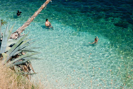 Bathers, Agia Efimia sea Kefalonia - Greeceの写真素材