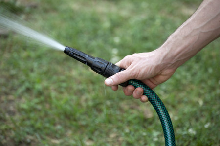 A man watering the garden 