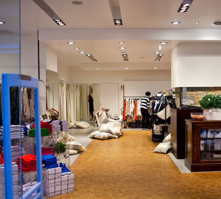 Clothes on a table in a Clothing store Clothes on a table in a Clothing store