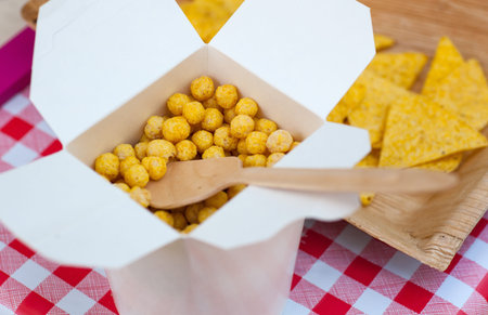 Photo of cheese Puff Balls inside a box