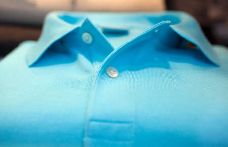 Photo of cyan Shirt poloin a clothes shopの写真素材