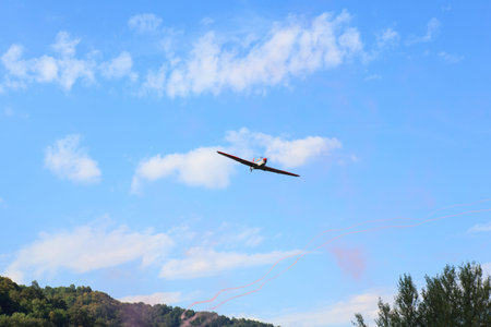 View of aerobatics in the blue skyの写真素材