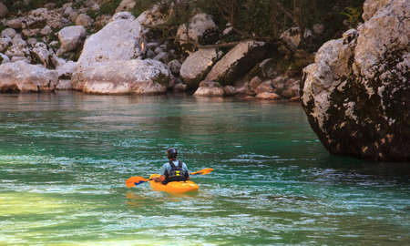 Kayaking in the summer on the Soca river, Sloveniaの写真素材