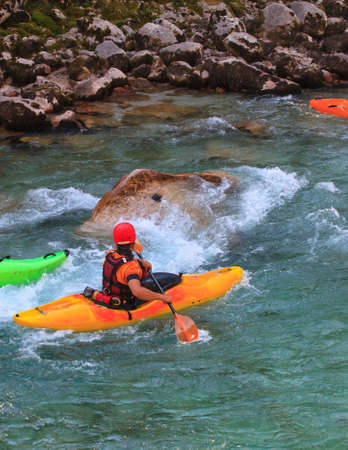 Kayaking in the summer on the Soca river, Sloveniaの写真素材