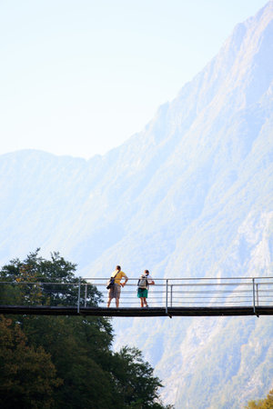 Friends on the rope bridge on Soca river, Sloveniaの写真素材