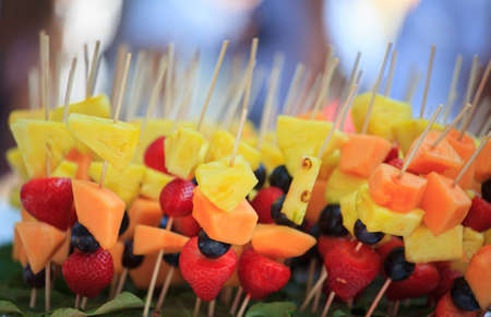 Buffet with a lot of colorful Fruit Kebabsの写真素材