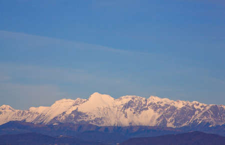 View of Julian Alps covered by snowの写真素材