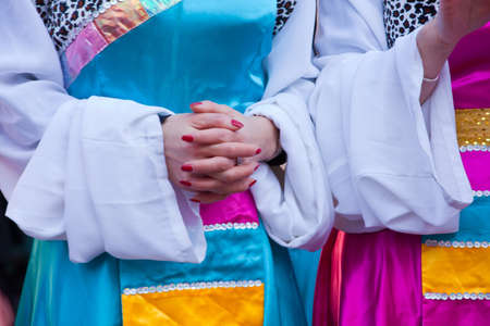 MILAN, ITALY - FEBRUARY 10: Girl in traditional costume in the Chinese New Year parade in Milan on February 10, 2013の写真素材