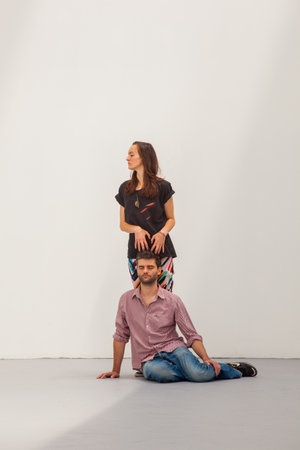 VENICE, ITALY - MAY 29: Performance in the Romanian Pavilion in the Venice biennale. Alexandra Pirici and Manuel PelmuÅ.An Immaterial Retrospective of the Venice Biennale, 2013. Quotation of âWall Enclosing a Spaceâ, intervention by Santiago Sierra,のeditorial素材