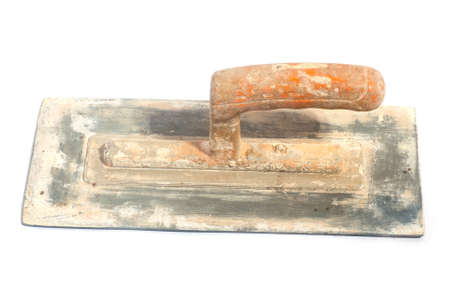 Close up of dirty trowel on whiteの写真素材