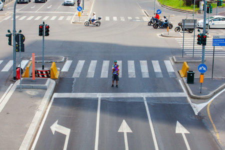 MILAN, ITALY -  MAY, 27: Juggler in the crossing road on May 27, 2014