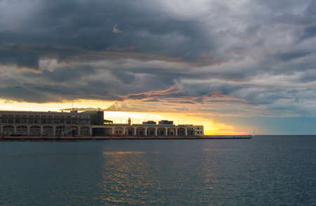 View of Trieste harbor at sunset, Italyの写真素材