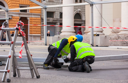 Construction workers assembling a steel frameのeditorial素材