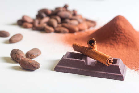Close up of chocolate bars, cocoa and cinnamonの写真素材