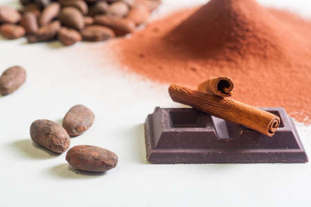 Close up of chocolate bars, cocoa and cinnamonの写真素材