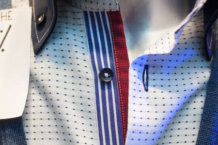 Close up of male shirts exposed in the clothes shopの写真素材