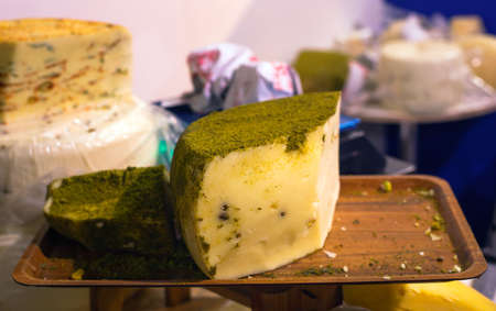 Sicilian cheese dressed with pistachio nuts grindの写真素材