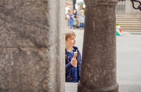 MILAN, ITALY - MARCH, 29: child eting a icecream on March 29, 2015のeditorial素材