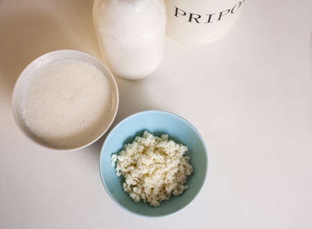 Organic probiotic milk kefir grains inside the bowlの写真素材