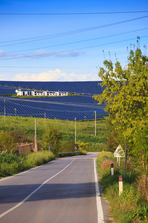 View of solar panels of photovoltaic modules for renewable energy in the Sicily countryside