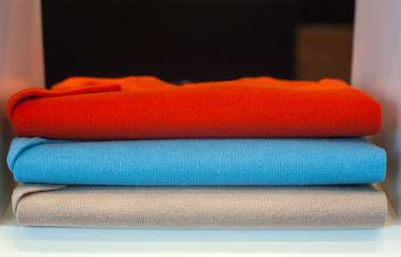 View of colorfull sweaterin the clothes shopの写真素材