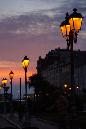 View of street lantern illuminated in Trieste, Italyのeditorial素材