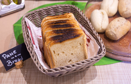 Loaf of bread fresh baked inside the wicker basket