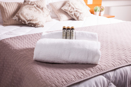 Towels and soap on bed of Ares hotelのeditorial素材