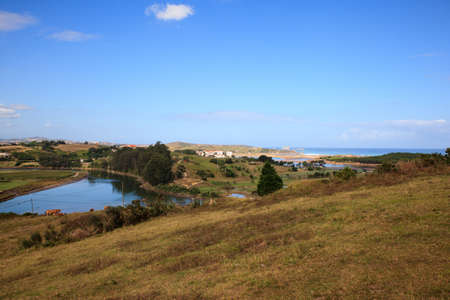 River Pas mouth, Liencres dunes nature reserve in the Cantabrian seaの写真素材