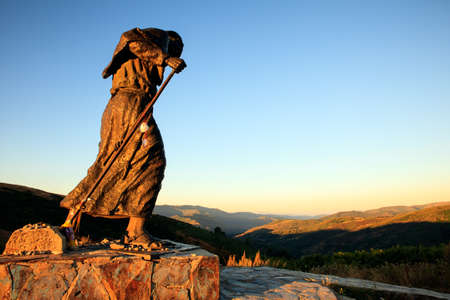 bronze statue of a pilgrim facing towards Santiago, Alto de San Roque, Spainの写真素材