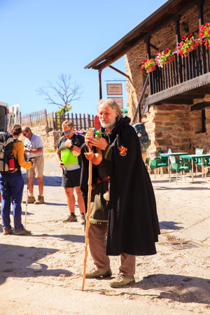 EL ACEBO DE SAN MIGUEL, SPAIN - AUGUST, 05: Pilgrimn with cloak and walking stick during the way of...